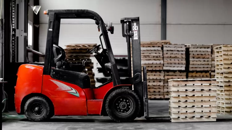 Forklift price comparison on warehouse equipment surrounded by pallets